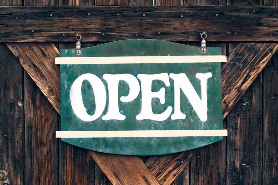 open sign on wooden door